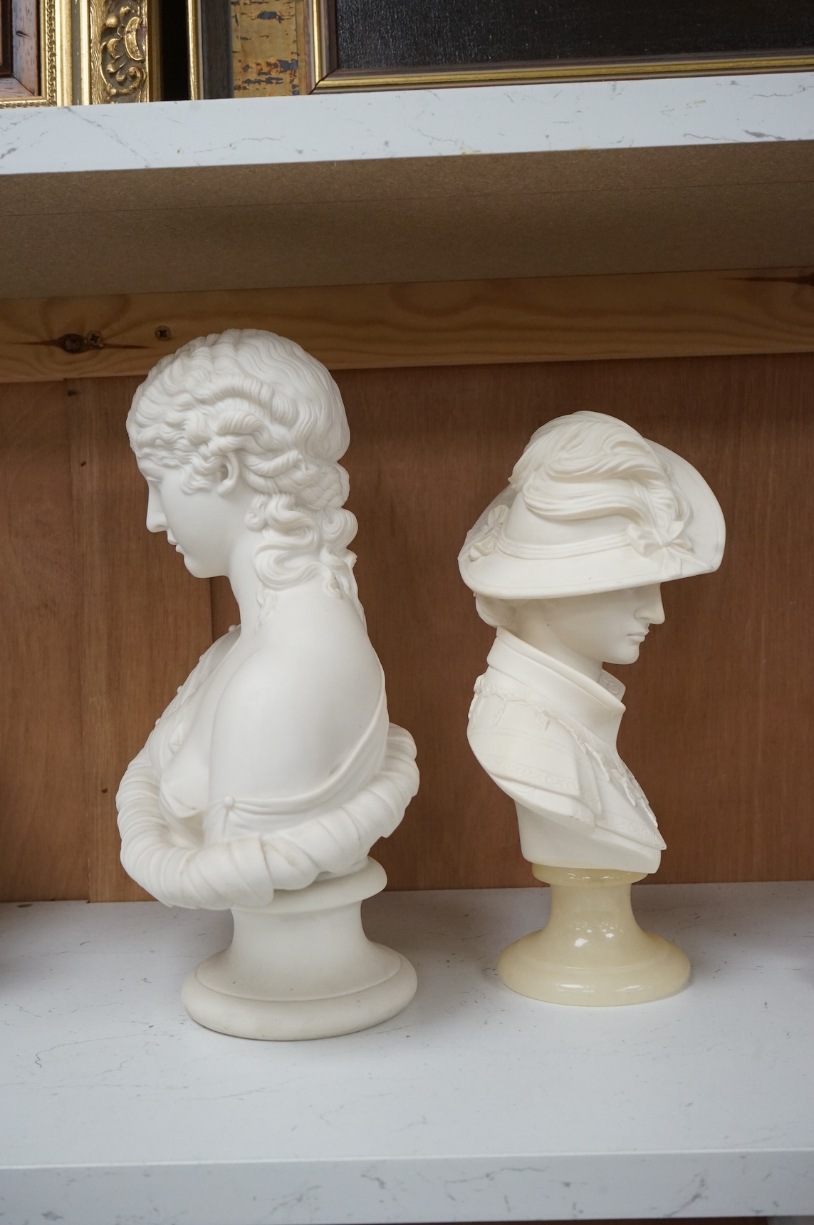 A 19th century Parian classical bust, Clytie, together with a modern Italian bust, tallest 29cm high.